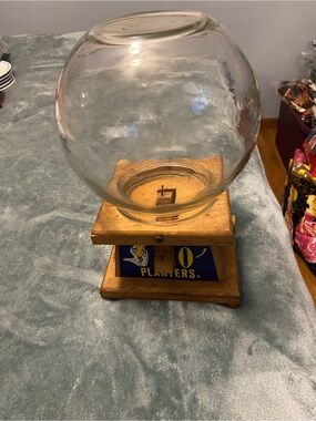 Peanuts Glass Candy Dispenser with Blue Logo and Natural Wood Base